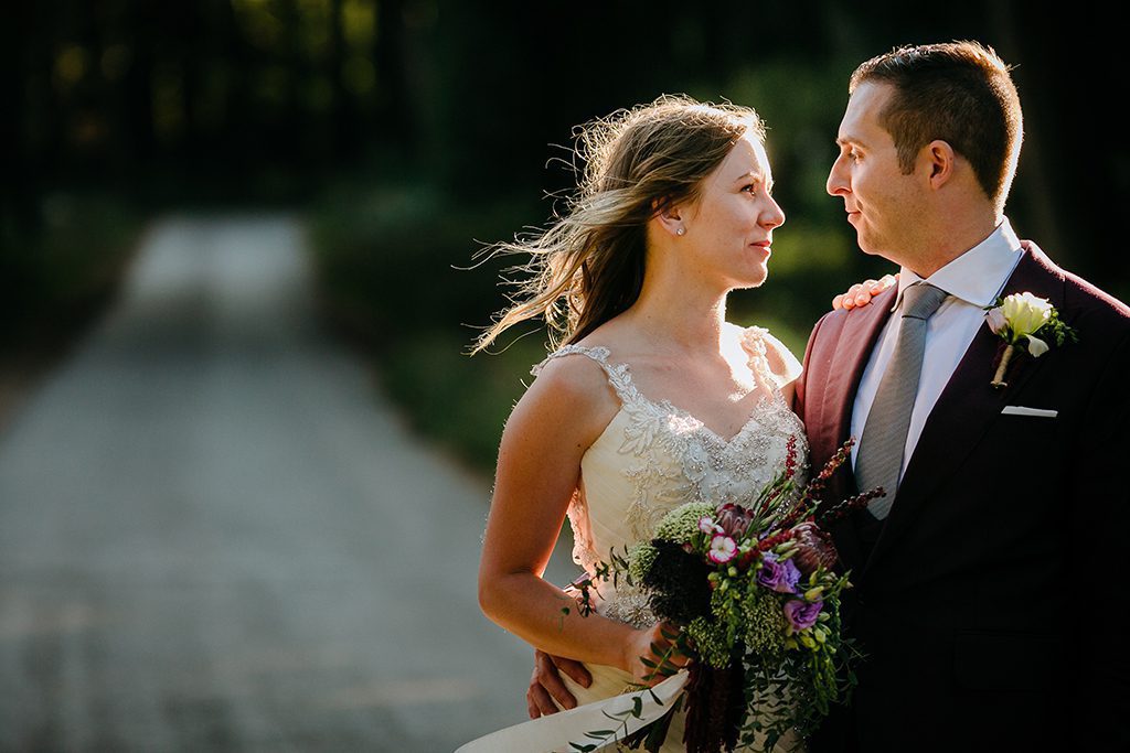 couple with flowers Portugal Luxury Weddings La Key events